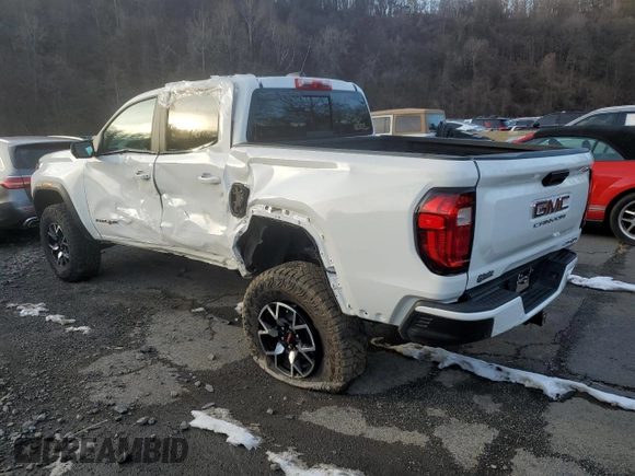 2024 GMC Canyon 4WD AT4X with VIN 1GTP6EEKXR1134879, listed as a Copart auction lot 44358345 with 12,567 mi miles and Salvage Title. Bid and sale history available at carsss.com. Image 2.