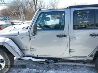 2018 Jeep Wrangler JK Unlimited Sahara with VIN 1C4HJWEG9JL801714, listed as a IAAI auction lot 41591307 with 79,201 mi miles. Bid and sale history available at carsss.com. Image 14.
