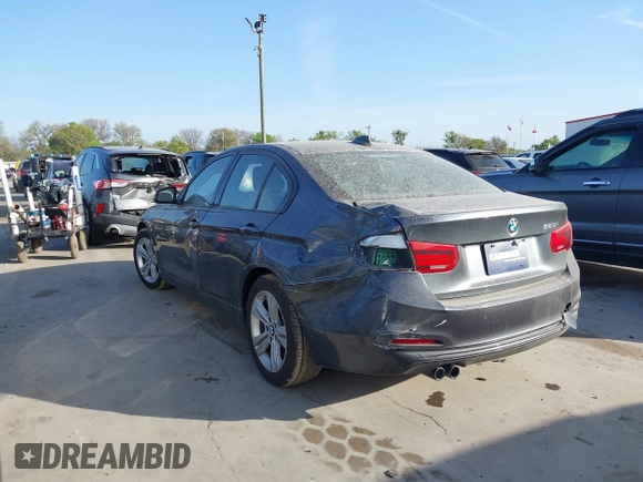 2016 BMW 3 Series 328i with VIN WBA8E9G56GNT82443, listed as a IAAI auction lot 41812424 with 56,965 mi miles. Bid and sale history available at carsss.com. Image 3.