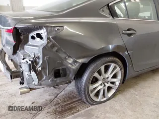 2017 Mazda Mazda6 Touring with VIN JM1GL1V57H1112266, listed as a IAAI auction lot 41553530 with 46,599 mi miles. Bid and sale history available at carsss.com. Image 6.