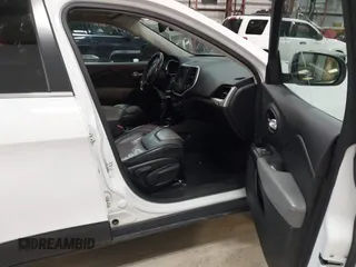 2014 Jeep Cherokee Limited with VIN 1C4PJMDS1EW235980, listed as a IAAI auction lot 41994044 with 128,292 mi miles and . Bid and sale history available at DreamBid. Image 5.