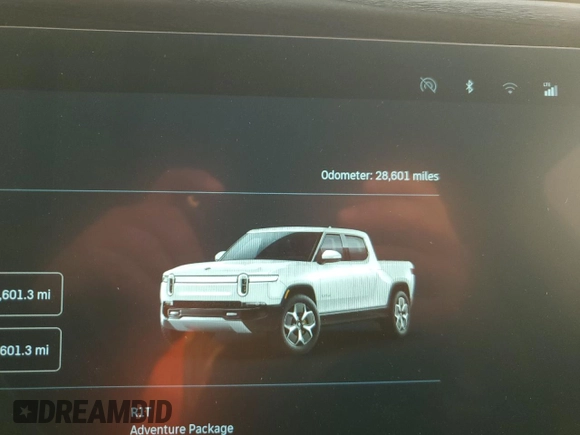 2022 Rivian R1T Adventure z VIN 7FCTGAAA9NN014280, wystawiony jako Copart lot #87908175 z przebiegiem 28 601 mil mil oraz Szkody całkowita. Historia ofert i sprzedaży dostępna na DreamBid. Obrazek 9.