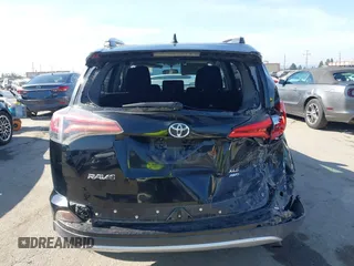 2016 Toyota RAV4 XLE with VIN 2T3RFREV6GW459313, listed as a IAAI auction lot 42074337 with 149,914 mi miles and . Bid and sale history available at DreamBid. Image 16.