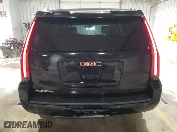 2015 GMC Yukon SLE with VIN 1GKS2AKC3FR664740, listed as a Copart auction lot 53824145 with 194,655 mi miles and Salvage Title. Bid and sale history available at carsss.com. Image 6.