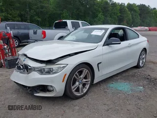 2014 BMW 4 Series 428i z VIN WBA3N3C5XEF711746, wystawiony jako IAAI lot #42215565 z przebiegiem 113 941 mil mil oraz . Historia ofert i sprzedaży dostępna na DreamBid. Obrazek 2.