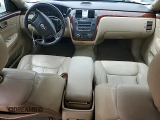 2007 Cadillac DTS V8 z VIN 1G6KD57Y57U215417, wystawiony jako Copart lot #57962455 z przebiegiem 87 592 mil mil oraz Tytuł czysty. Historia ofert i sprzedaży dostępna na DreamBid. Obrazek 8.