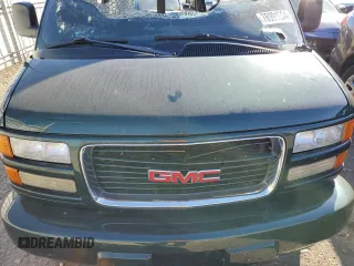 2002 GMC Savana z VIN 1GDFG65R221107446, wystawiony jako Copart lot #76991664 z przebiegiem Nie podano mil oraz Czysty tytuł • Clean title. Historia ofert i sprzedaży dostępna na DreamBid. Obrazek 12.