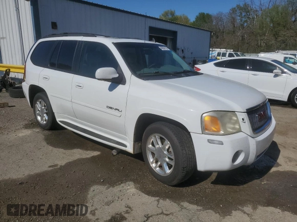 2007 GMC Envoy Denali with VIN 1GKES63M172227637, listed as a Copart auction lot 49858135 with 198,736 mi miles and Salvage Title. Bid and sale history available at carsss.com. Image 4.