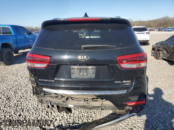 2016 Kia Sorento SXL with VIN 5XYPK4A15GG119688, listed as a Copart auction lot 49957995 with 180,064 mi miles and Salvage Title. Bid and sale history available at carsss.com. Image 6.