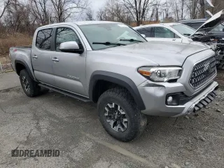 2018 Toyota Tacoma SR z VIN 3TMCZ5AN2JM122416, wystawiony jako Copart lot #50816965 z przebiegiem Nie podano mil oraz Szkoda całkowita • Salvage title. Historia ofert i sprzedaży dostępna na DreamBid. Obrazek 4.