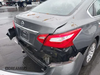 2017 Nissan Altima S with VIN 1N4AL3AP2HC212617, listed as a IAAI auction lot 41974656 with 115,869 mi miles and . Bid and sale history available at DreamBid. Image 18.
