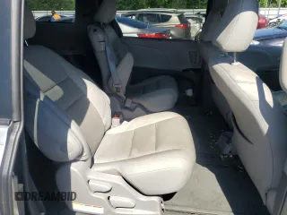 2016 Toyota Sienna XLE с VIN 5TDYK3DC9GS718138, выставлен на аукционе Copart как лот 57137635 с пробегом 105 384 миль миль и Списание • Salvage title. История ставок и продаж доступна на DreamBid. Изображение 11.