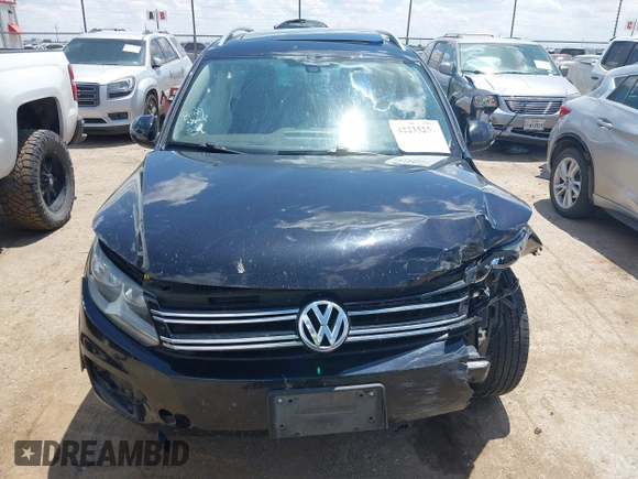 2017 Volkswagen Tiguan Wolfsburg Edition z VIN WVGSV7AX1HW503670, wystawiony jako IAAI lot #42235251 z przebiegiem 88 477 mil mil oraz . Historia ofert i sprzedaży dostępna na DreamBid. Obrazek 12.