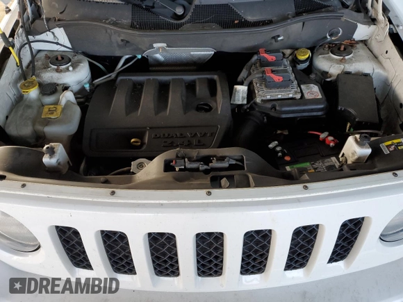 2014 Jeep Patriot Latitude with VIN 1C4NJRFB2ED665093, listed as a Copart auction lot 85868964 with 110,066 mi miles and Salvage title. Bid and sale history available at DreamBid. Image 12.