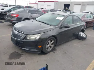 2014 Chevrolet Cruze 1LT with VIN 1G1PC5SB4E7134678, listed as a IAAI auction lot 42171165 with 125,225 mi miles and . Bid and sale history available at DreamBid. Image 2.