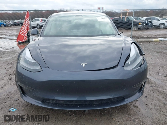 2022 Tesla Model 3 Long Range with VIN 5YJ3E1EB8NF201023, listed as a IAAI auction lot 41942943 with 30,635 mi miles and . Bid and sale history available at DreamBid. Image 11.