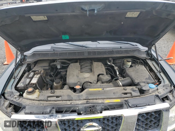2005 Nissan Titan SE with VIN 1N6AA06B05N548873, listed as a Copart auction lot 57341215 with 178,722 mi miles and Salvage title. Bid and sale history available at DreamBid. Image 11.