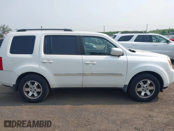 2011 Honda Pilot Touring z VIN 5FNYF4H9XBB003469, wystawiony jako IAAI lot #42369323 z przebiegiem 201 958 mil mil oraz . Historia ofert i sprzedaży dostępna na DreamBid. Obrazek 13.