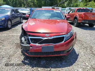 2011 Kia Optima EX z VIN KNAGN4A74B5119658, wystawiony jako Copart lot #56849105 z przebiegiem 117 269 mil mil oraz Szkoda całkowita • Salvage title. Historia ofert i sprzedaży dostępna na DreamBid. Obrazek 5.
