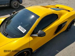 2016 McLaren 650S z VIN SBM11FAA6GW006251, wystawiony jako Copart lot #70628064 z przebiegiem 13 452 mil mil oraz Szkody całkowita. Historia ofert i sprzedaży dostępna na DreamBid. Obrazek 13.