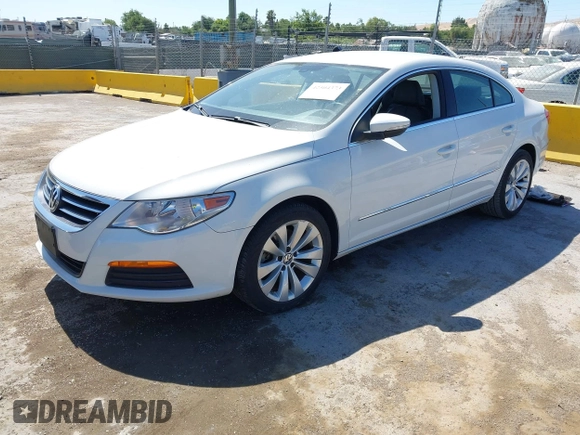2012 Volkswagen CC Sport with VIN WVWNP7AN0CE532764, listed as a IAAI auction lot 42504373 with 97,562 mi miles and . Bid and sale history available at DreamBid. Image 2.