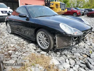 1999 Porsche 911 z VIN WP0AA2990XS626600, wystawiony jako Copart lot #56749505 z przebiegiem 82 979 mil mil oraz Szkody całkowita. Historia ofert i sprzedaży dostępna na DreamBid. Obrazek 4.