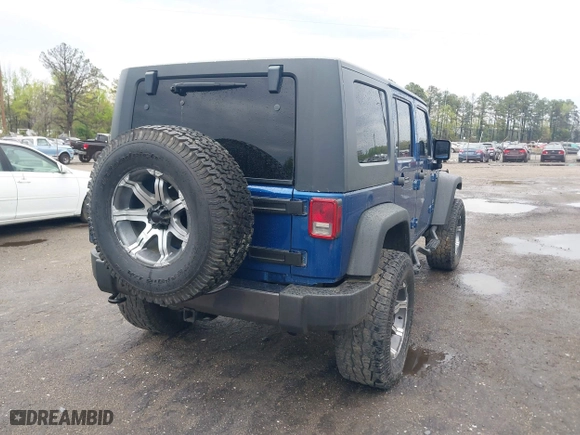 2010 Jeep Wrangler Unlimited Sport with VIN 1J4BA3H11AL144560, listed as a IAAI auction lot 42013032 with 226,233 mi miles. Bid and sale history available at carsss.com. Image 4.