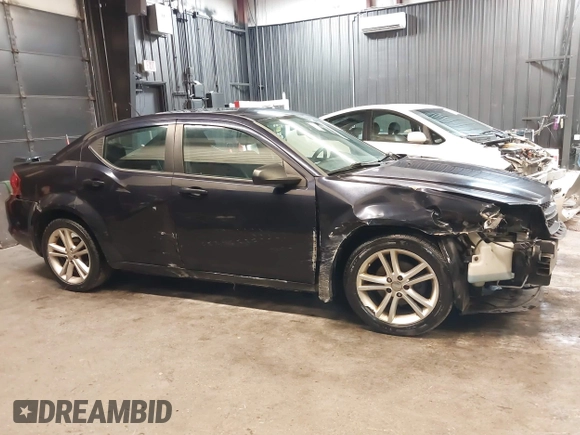 2012 Dodge Avenger SE with VIN 1C3CDZAGXCN287490, listed as a IAAI auction lot 42142222 with 122,310 mi miles and . Bid and sale history available at DreamBid. Image 6.