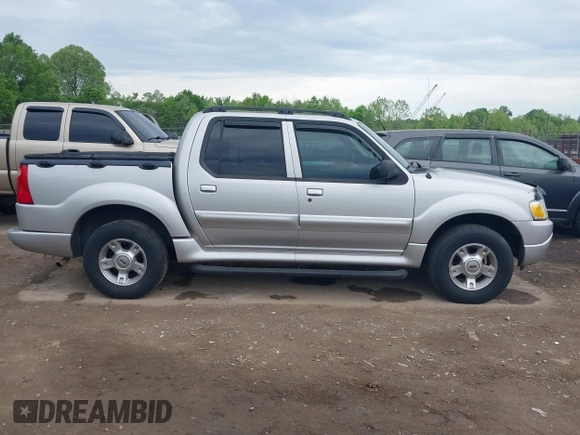 2004 Ford Explorer Sport Trac XLS z VIN 1FMDU77K74UA77223, wystawiony jako IAAI lot #42167996 z przebiegiem Nie podano mil oraz . Historia ofert i sprzedaży dostępna na DreamBid. Obrazek 13.