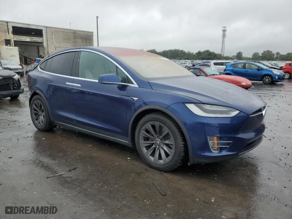 2018 Tesla Model X 75D with VIN 5YJXCBE23JF119787, listed as a Copart auction lot 72290734 with NaN miles and Salvage Title. Bid and sale history available at carsss.com. Image 4.