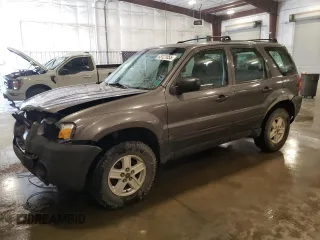 2006 Ford Escape XLS z VIN 1FMYU92Z16KB11107, wystawiony jako Copart lot #63121055 z przebiegiem 390 333 mil mil oraz Szkoda całkowita • Salvage title. Historia ofert i sprzedaży dostępna na DreamBid. Obrazek 1.