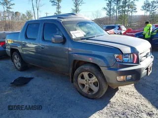 2010 Honda Ridgeline RTL with VIN 5FPYK1F52AB004678, listed as a IAAI auction lot 41661968 with 169,021 mi miles. Bid and sale history available at carsss.com. Image 1.