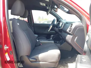 2018 Toyota Tacoma SR5 with VIN 5TFAZ5CN0JX063350, listed as a IAAI auction lot 41829396 with 61,155 mi miles and . Bid and sale history available at DreamBid. Image 5.