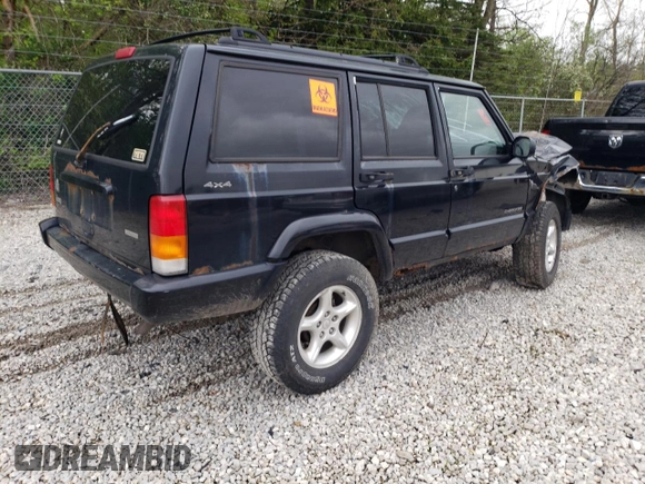 2001 Jeep Cherokee Sport с VIN 1J4FF48S31L615450, выставлен на аукционе Copart как лот 55835585 с пробегом 246 694 миль миль и Списание • Salvage title. История ставок и продаж доступна на DreamBid. Изображение 3.