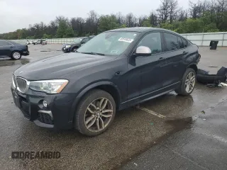 2018 BMW X4 M40i with VIN 5UXXW7C59J0W65573, listed as a Copart auction lot 60549625 with 115,647 mi miles and Salvage title. Bid and sale history available at DreamBid. Image 1.