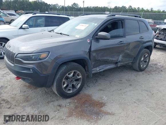 2019 Jeep Cherokee Trailhawk z VIN 1C4PJMBX1KD314121, wystawiony jako IAAI lot #42106721 z przebiegiem 105 631 mil mil oraz . Historia ofert i sprzedaży dostępna na DreamBid. Obrazek 18.