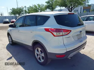 2015 Ford Escape SE with VIN 1FMCU0GX7FUA22322, listed as a IAAI auction lot 41942310 with 157,107 mi miles. Bid and sale history available at carsss.com. Image 3.