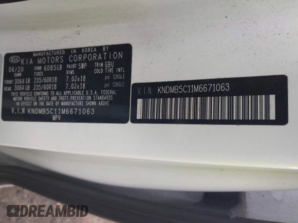 2021 Kia Sedona EX with VIN KNDMB5C11M6671063, listed as a IAAI auction lot 41707868 with 130,891 mi miles. Bid and sale history available at carsss.com. Image 9.