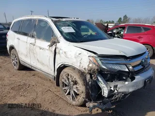 2022 Honda Pilot Touring 7-Passenger с VIN 5FNYF5H64NB015410, выставлен на аукционе IAAI как лот 41776850 с пробегом 39 475 миль миль и . История ставок и продаж доступна на DreamBid. Изображение 1.