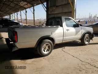 1998 Nissan Frontier XE with VIN 1N6DD21S1WC329392, listed as a Copart auction lot 73609304 with Not provided miles and Salvage title. Bid and sale history available at DreamBid. Image 3.