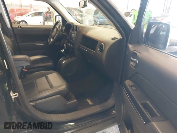 2014 Jeep Patriot Limited with VIN 1C4NJRCB4ED629085, listed as a IAAI auction lot 39414215 with 87,409 mi miles. Bid and sale history available at carsss.com. Image 5.