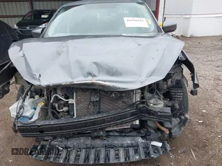 2017 Nissan Sentra SV z VIN 3N1AB7AP0HY376480, wystawiony jako IAAI lot #41936237 z przebiegiem 74 010 mil mil oraz . Historia ofert i sprzedaży dostępna na DreamBid. Obrazek 6.