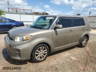 2012 Scion xB with VIN JTLZE4FE3C1144356, listed as a Copart auction lot 48751865 with 156,959 mi miles and Clean Title. Bid and sale history available at carsss.com. Image 1.