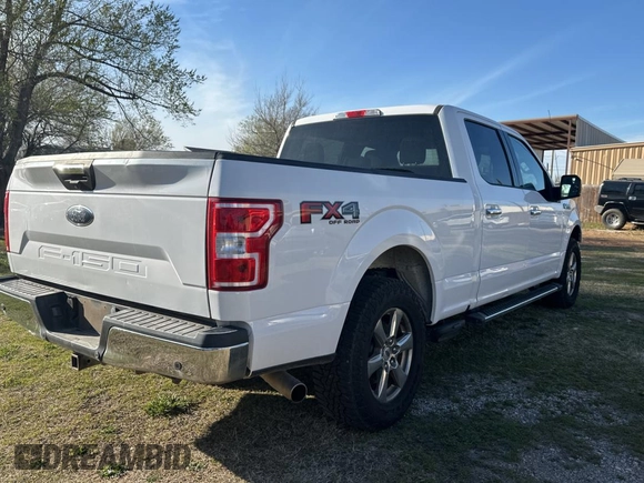 2018 Ford F-150 XL with VIN 1FTFW1E5XJKE02519, listed as a Copart auction lot 50268565 with 184,094 mi miles and Clean title. Bid and sale history available at DreamBid. Image 4.