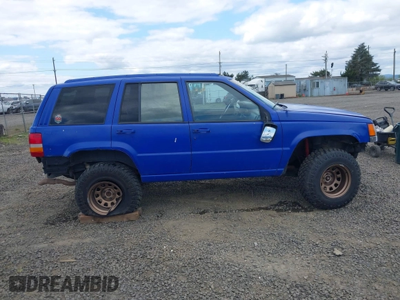 1996 Jeep Grand Cherokee Laredo with VIN 1J4GZ58YXTC329037, listed as a IAAI auction lot 42051175 with 314,571 mi miles and . Bid and sale history available at DreamBid. Image 13.