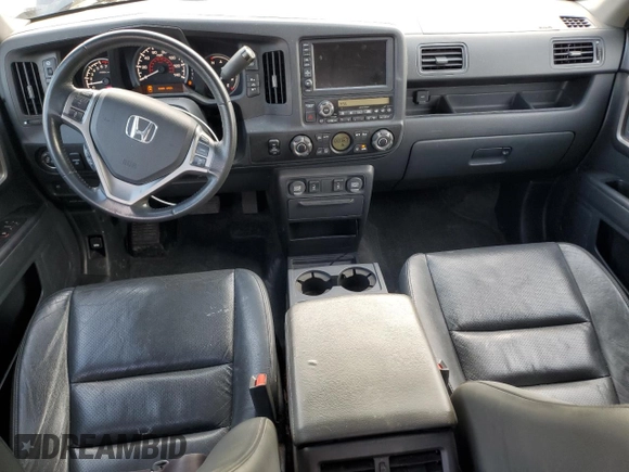 2012 Honda Ridgeline RTL с VIN 5FPYK1F56CB456555, выставлен на аукционе Copart как лот 54237205 с пробегом 191 967 миль миль и Списание • Salvage title. История ставок и продаж доступна на DreamBid. Изображение 8.