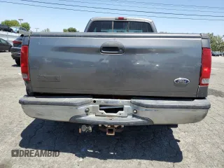 2004 Ford F-250 XL with VIN 1FTNX20L64EB19073, listed as a Copart auction lot 57533145 with 287,118 mi miles and Salvage title. Bid and sale history available at DreamBid. Image 6.