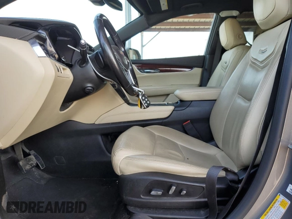 2019 Cadillac XT5 Luxury FWD z VIN 1GYKNCRS4KZ221304, wystawiony jako Copart lot #54995415 z przebiegiem 128 940 mil mil oraz Szkoda całkowita • Salvage title. Historia ofert i sprzedaży dostępna na DreamBid. Obrazek 7.