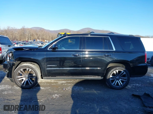 2019 GMC Yukon Denali with VIN 1GKS2CKJ2KR137664, listed as a IAAI auction lot 41335229 with 151,394 mi miles and . Bid and sale history available at DreamBid. Image 15.