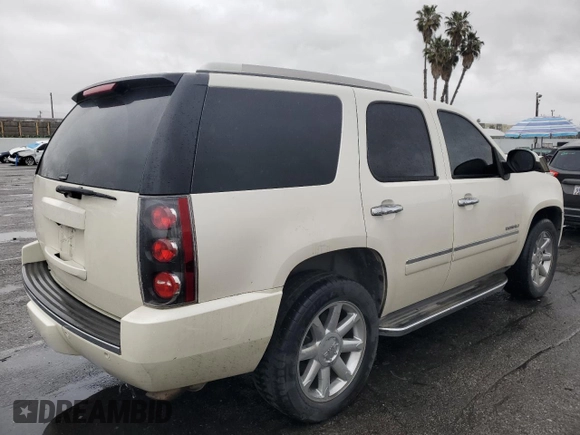 2011 GMC Yukon Denali with VIN 1GKS1EEF2BR337370, listed as a Copart auction lot 49311105 with 131,840 mi miles and Salvage Title. Bid and sale history available at carsss.com. Image 3.